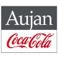 Aujan and Coca-Cola logos displayed in grey and red, representing a partnership in beverage manufacturing.