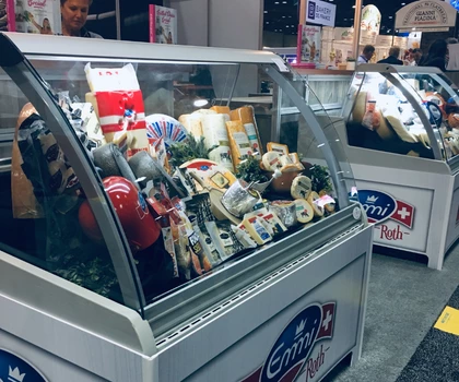 A display freezer filled with various ice cream products, featuring colourful packaging and branding.