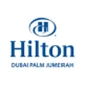 Hilton Dubai Palm Jumeirah logo in blue, featuring a stylised hotel icon and elegant typography.