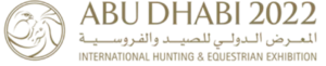 Gold text displaying "ADIHEX" on a dark background, indicating the Abu Dhabi International Hunting and Equestrian Exhibition.