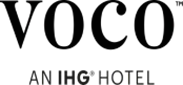 Green and black voco Hotels logo with modern typography, representing short-term rental services.