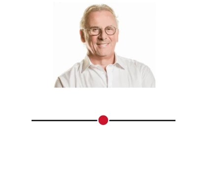 Smiling man with glasses wearing a white shirt against a plain white background.