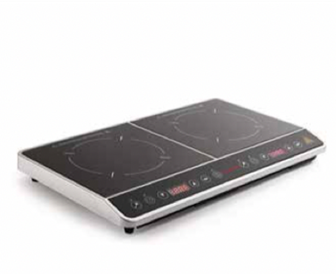 Double induction cooktop with a sleek black surface and silver edges, featuring touch controls.