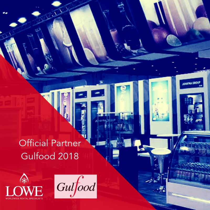 Lowe's display at Gulfood 2018, featuring blue tones and promotional signage for the event.