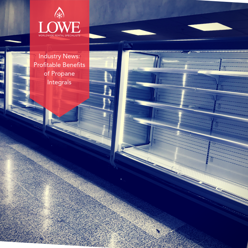 Empty refrigerated display cases with a sleek, metallic finish, featuring bright LED lighting.