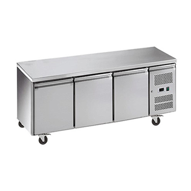 Stainless steel three-door bench chiller with wheels and control panel on the right side.