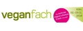 Veganfach exhibition logo featuring green text and a pink circular accent with event details.