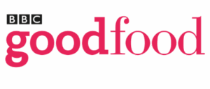 Bright pink background featuring the word "GoodFood" in a bold, stylised font.
